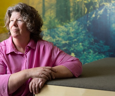 Lady looking warmly into the light