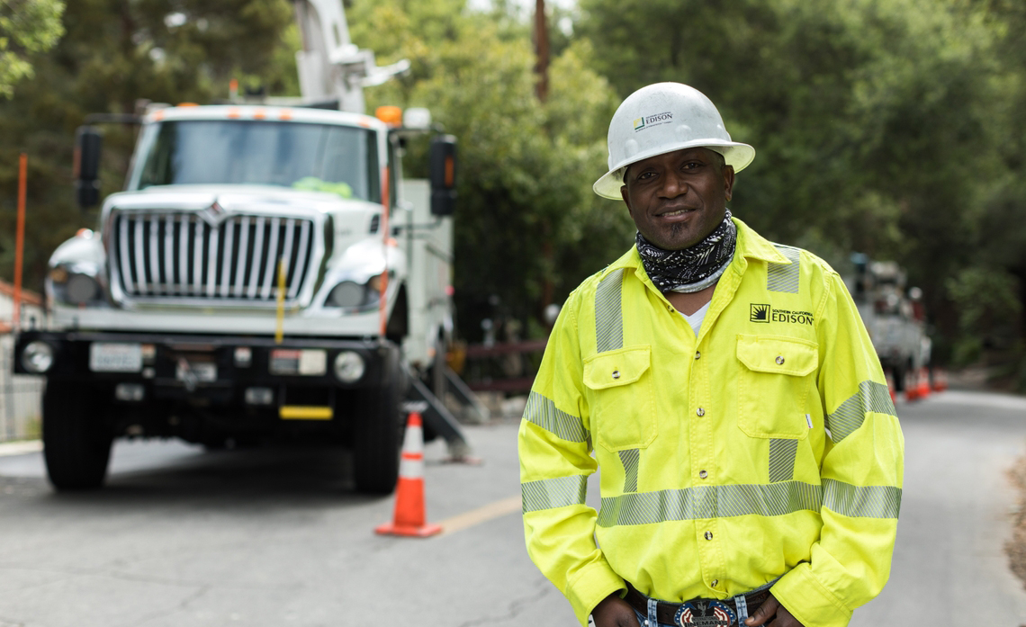 Shot of a lineman worker at work in an open street environment
