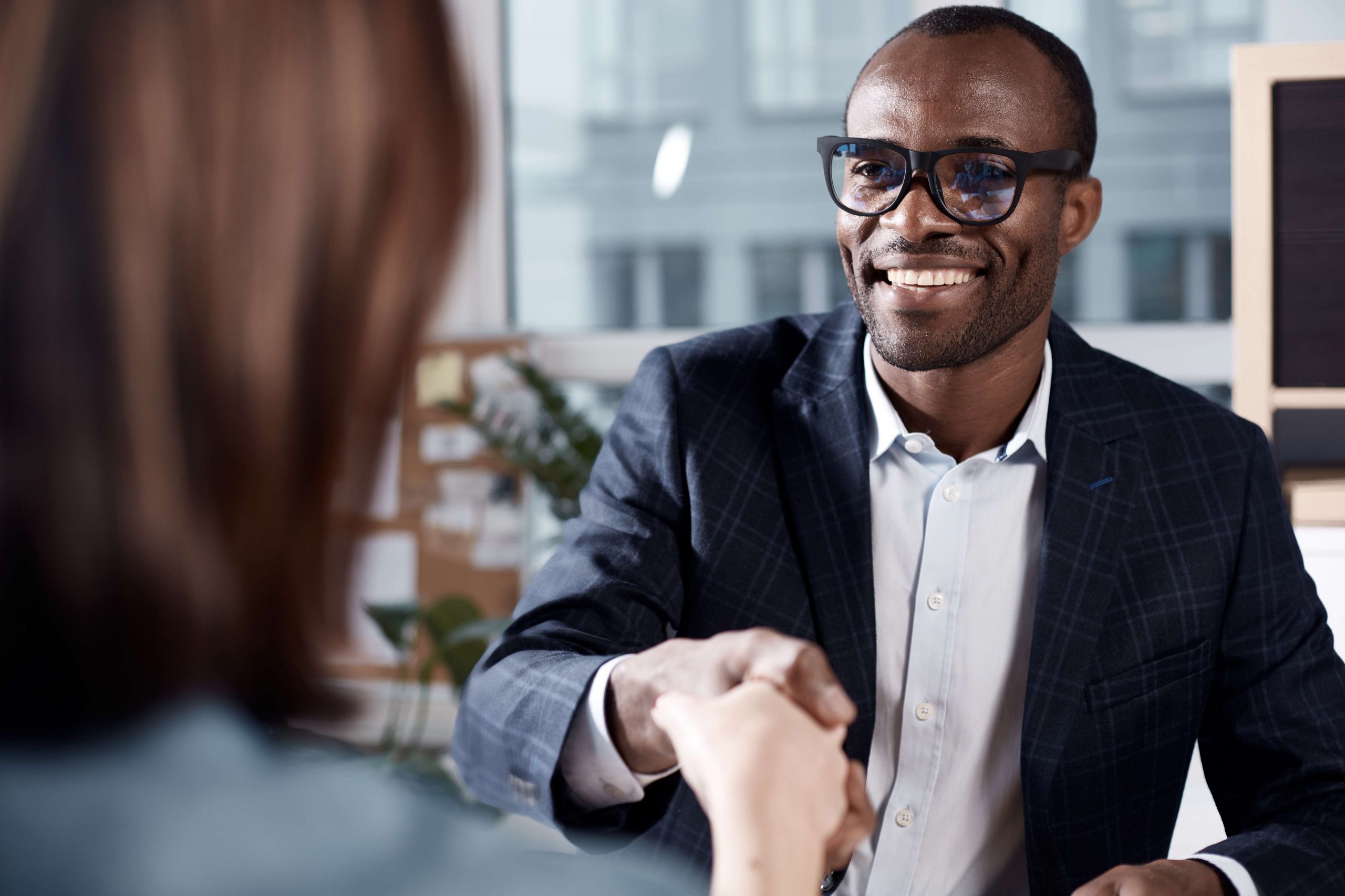 A man shaking someone's hand