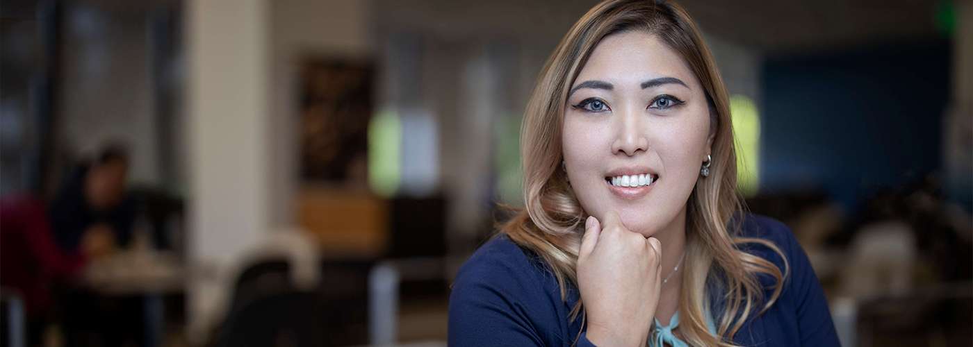 A woman smiling