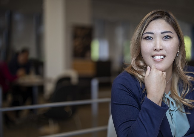 A woman smiling